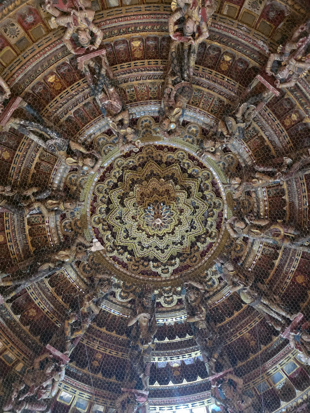 A carved ceiling &mdash; Jain temple work, cut from a single block. Easy to walk past, hard to stop looking at.